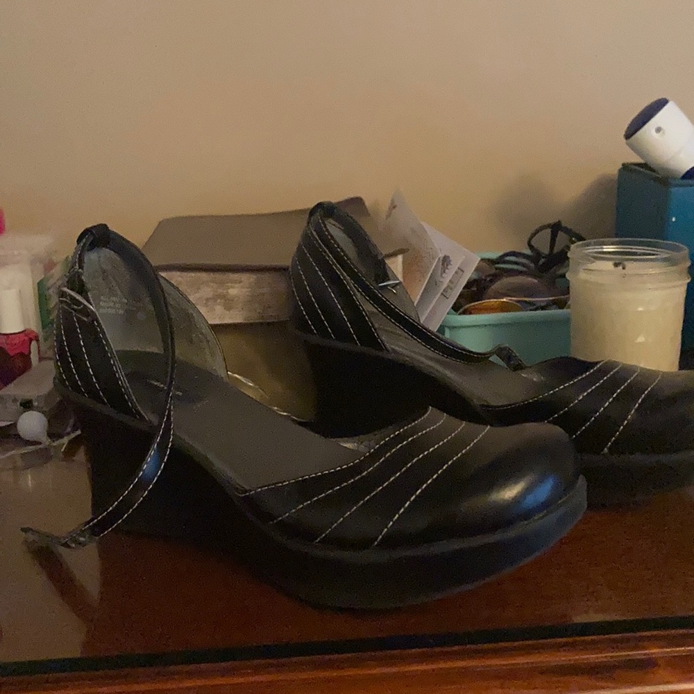 Black heels with white stitching